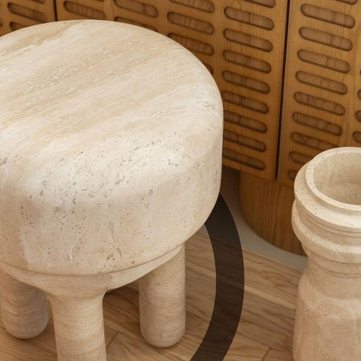 Close crop of honed travertine